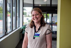 A woman standing in an office
