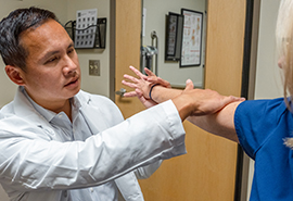 Jimmy Dang, DO with patient