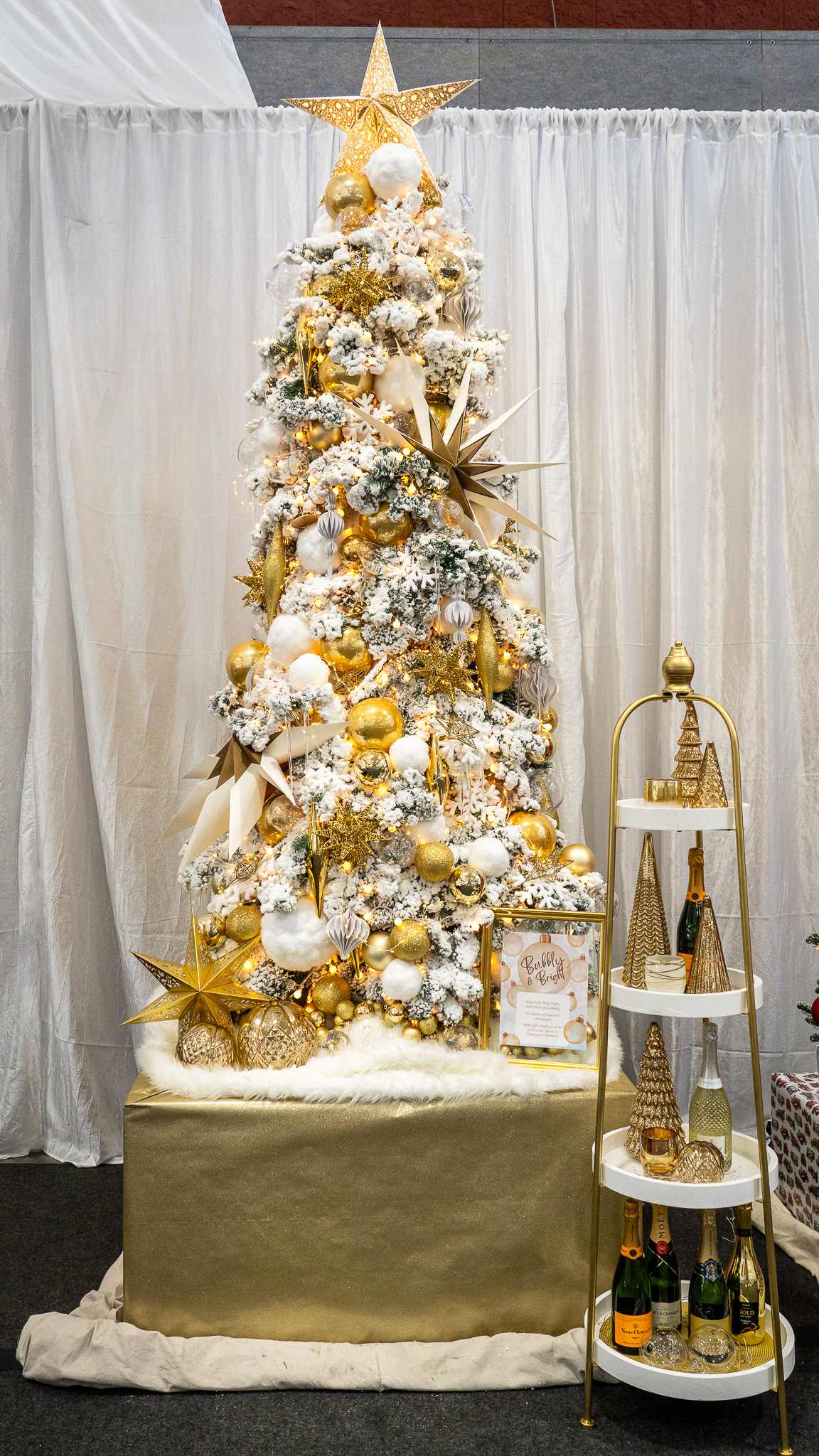 Christmas tree decorated in gold and white