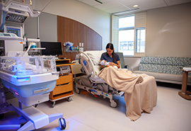 A mother with her newborn baby in a maternal suite in the Skagit Valley Hospital Family Birth Center.