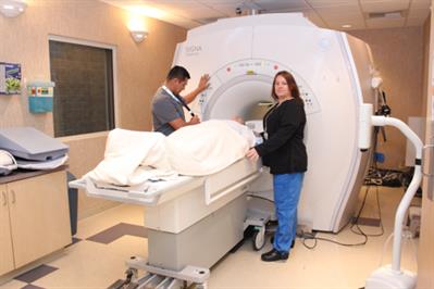 Technicians with patient
