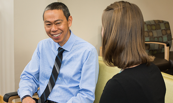 Dr. Ang with patient