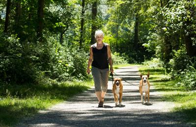 Woman walking dog