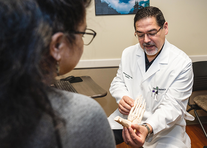 Dr. Riojas with patient